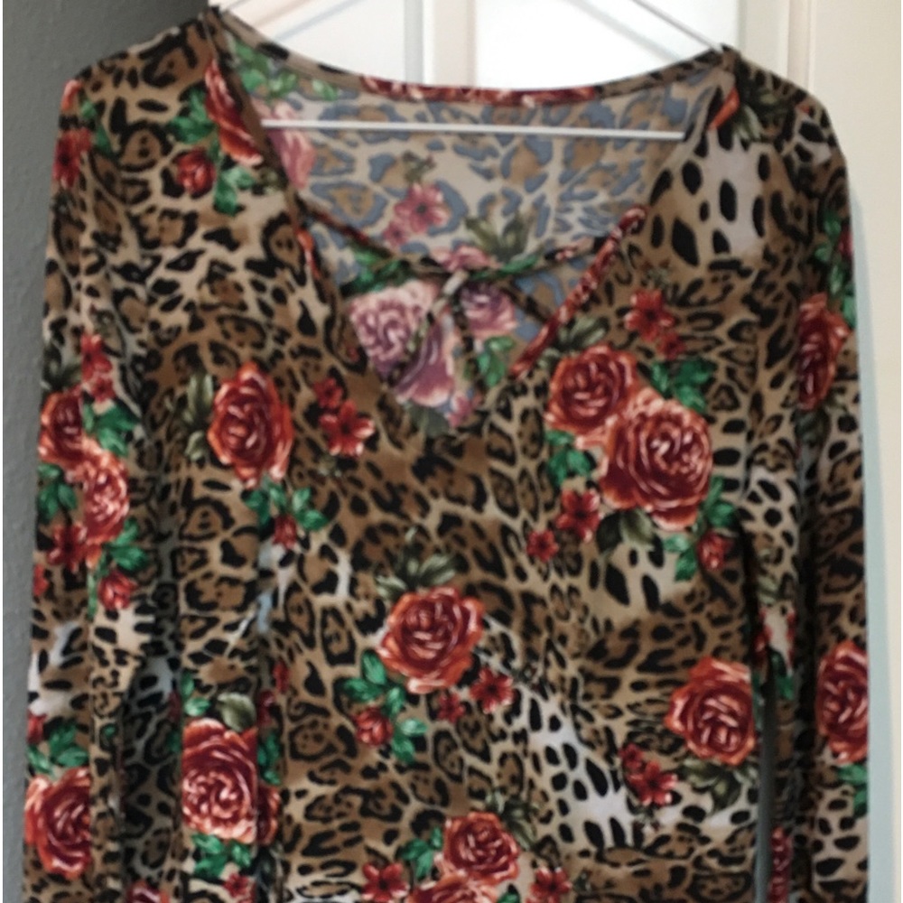 Zutter brand; leopard and floral design top; size medium top